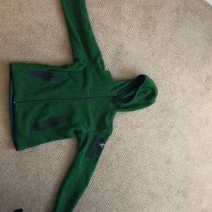 Green hooded arcteryx fleece